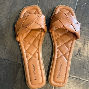 NEW braided flat sandal. Size 9. Fits true to size